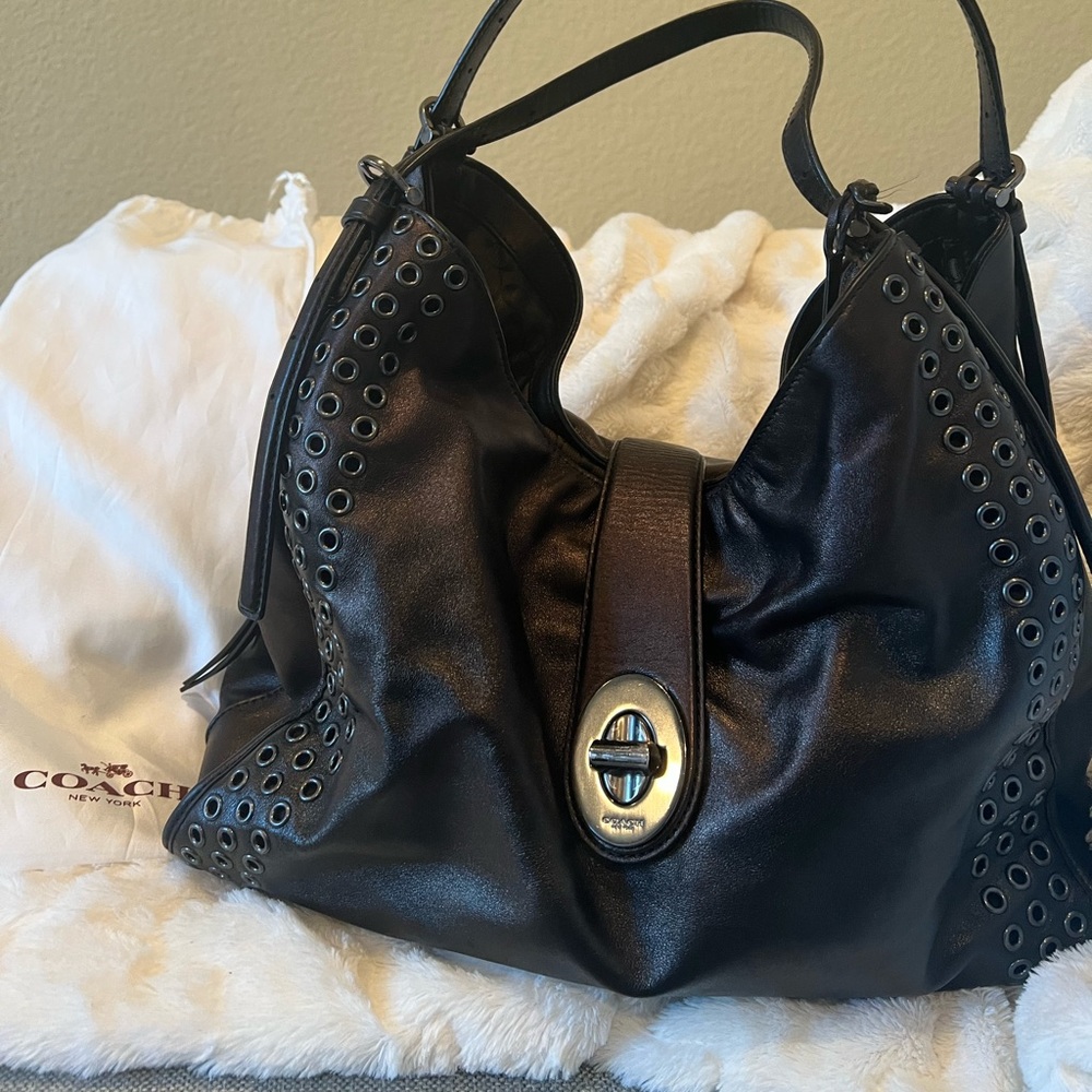 Coach Madison Grommet Carlyle shoulder bag. Very roomie with three compartments.